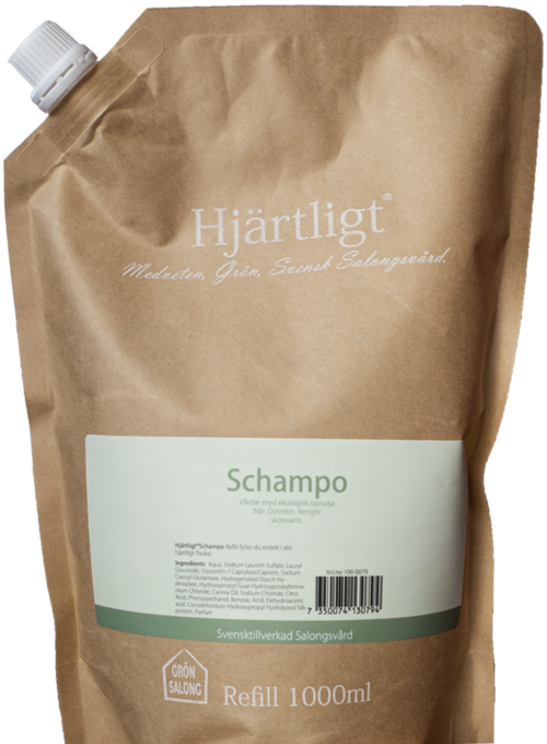 A beige refill pouch labeled 'Hjärtligt' with a white and green 'Shampoo' label, holding 1000 ml.