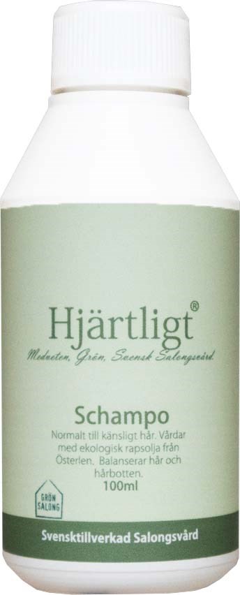 A white shampoo bottle with green label, labeled Hjärtligt, 100ml, for sensitive, balanced hair and scalp.