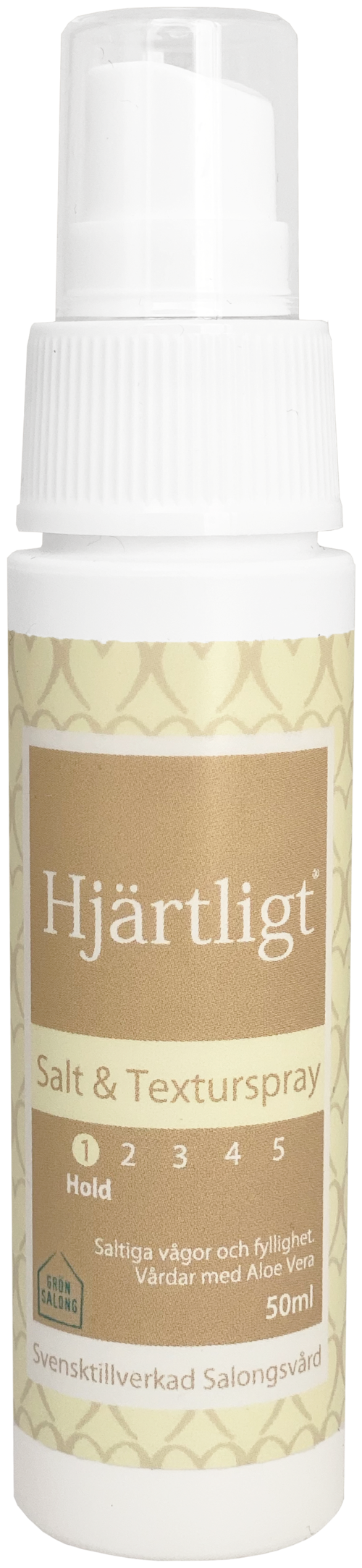 A small white spray bottle labeled 'Hjärtligt' with salt and texture spray for hair styling.
