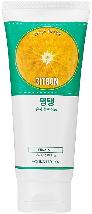 A tube of skincare cream with a citrus fruit image, labeled 'Citron' and 'Firming', from Holika Holika.