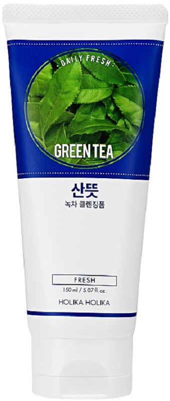 Een witte en blauwe tube met 'Greentea' label, afbeelding van groene bladeren en merk 'Holika Holika'.