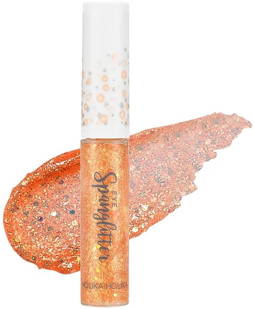 Leppeglansrør med skinnende oransje farge og hvit topp. Glitter sprer seg bakover.