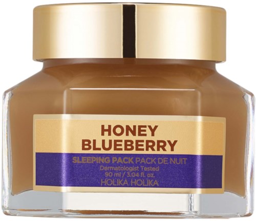 A jar of honey and blueberry sleeping pack with gold lid and label details.
