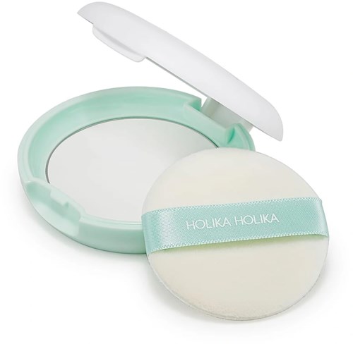 A mint green compact mirror with a flip lid and a round applicator puff with a blue strap.