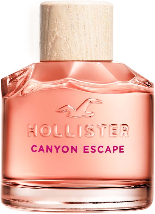 Roze parfumfles met houten dop, gemarkeerd 'Hollister Canyon Escape'.