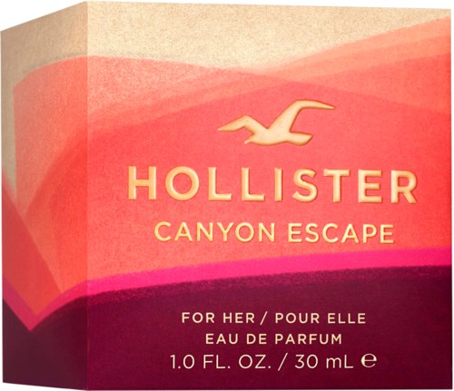 En rosa och orange box med Hollister-loggan och text för en parfym som heter Canyon Escape.