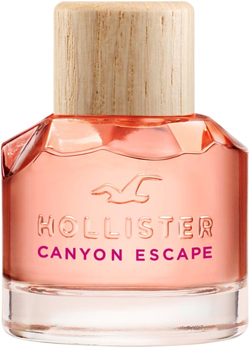 Roze nagellak in een glazen fles met houten dop, gemarkeerd 'Hollister Canyon Escape.'