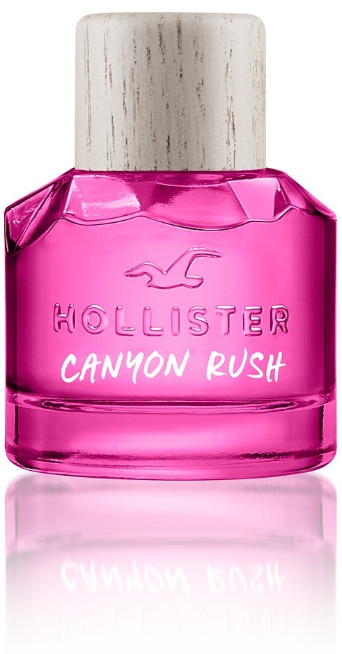 Roze parfumfles met witte dop, labeled 'Hollister Canyon Rush'.