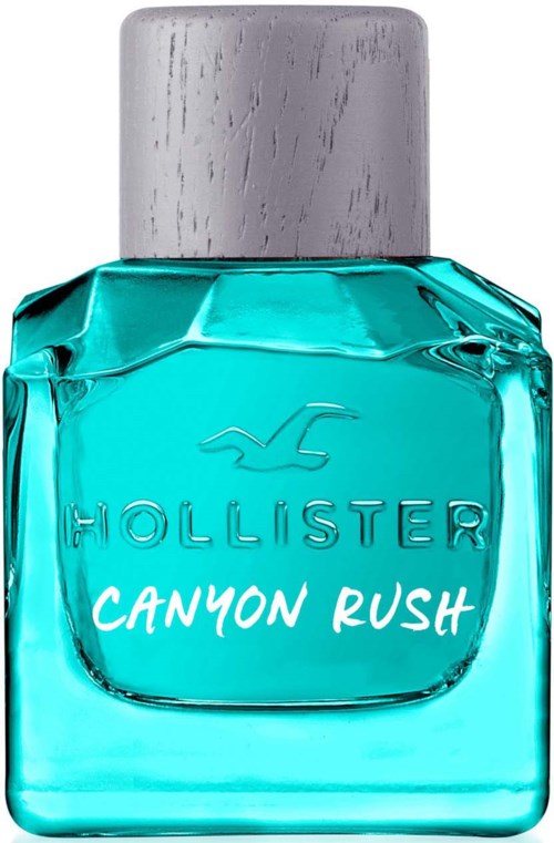 Een turquoise fles met zilveren dop, gemerkt 'Hollister Canyon Rush,' ziet er verfrissend en zomers uit.