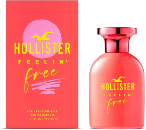 Roze en gele verpakking met parfumfles en doos, met een gele vogel-logo en de woorden 'Hollister Feelin' Free.'