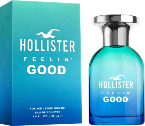 Een fles Hollister Feelin' Good geur naast de blauwe doos. De fles is blauw met een zilveren dop.