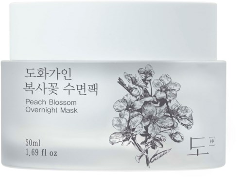 Weiße Verpackung mit schwarzem Text und Blumenbild, bezeichnet als Peach Blossom Overnight Mask, 50 ml.