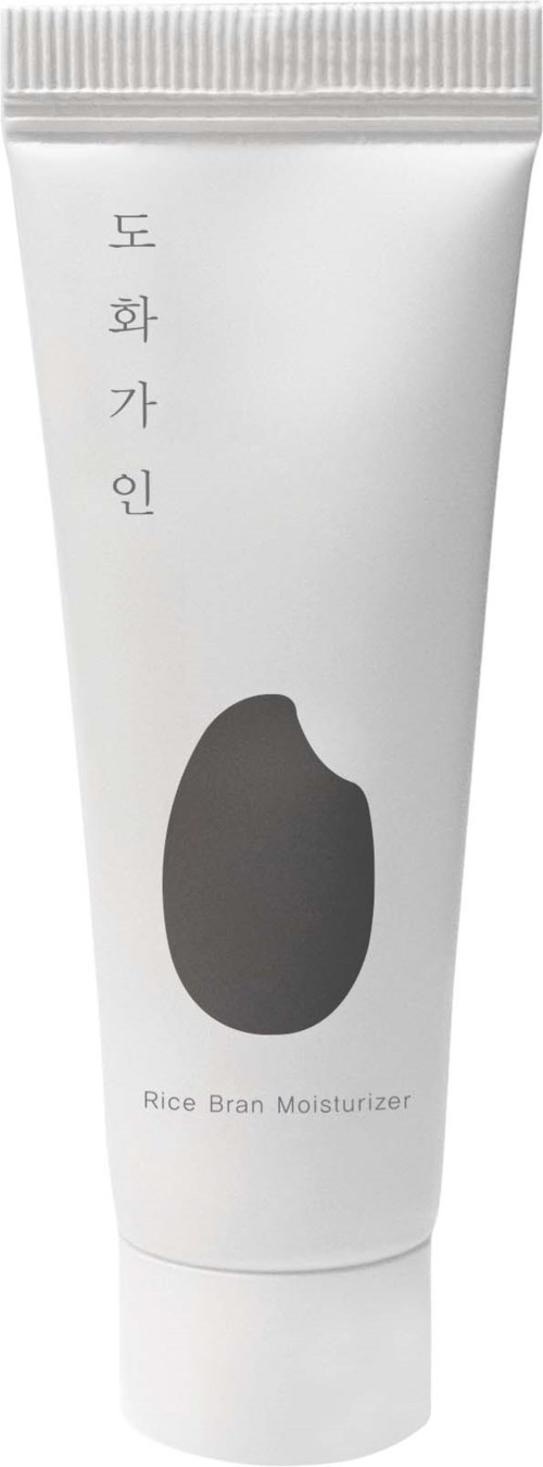 En vit tub med koreansk text och en illustration av ris, märkt Ris Skal Fuktighetskräm.