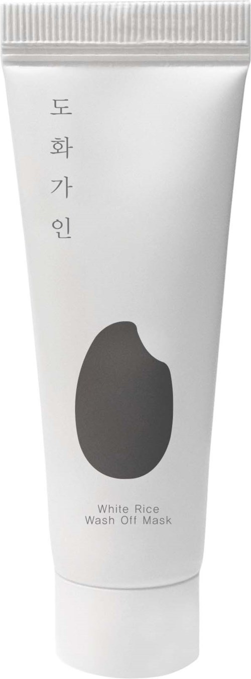 En vit tub märkt 'White Rice Wash Off Mask' med koreansk text och ett svart ovalformigt märke.