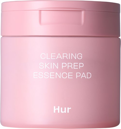 Een roze pot met deksel, labelt als huidvoorbereiding essence pad door Hur.