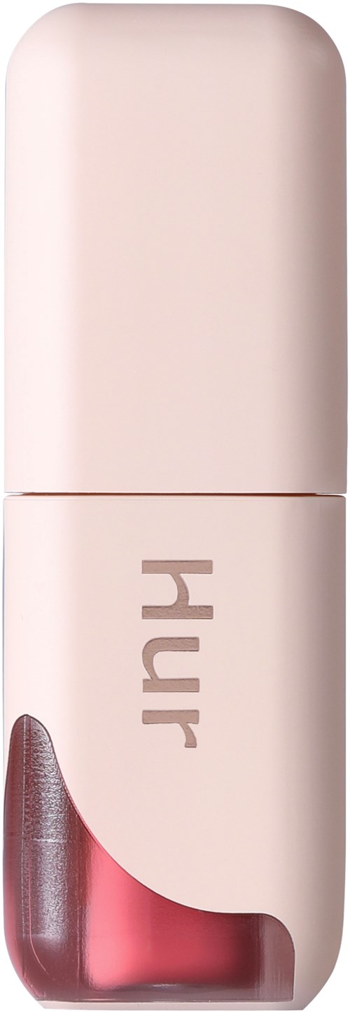 Een roze lippenbalsem tube met de merknaam "Huda".