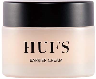 Ein Behälter mit schwarzem Deckel, beschriftet mit 'HUFS Barrier Cream' in einfacher Schrift.