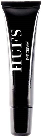 Schwarze Tube mit der Aufschrift 'HUE'S EYE CREAM' steht aufrecht.