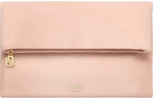 A pale pink clutch bag with a front flap, gold logo, and small gold zipper charm.