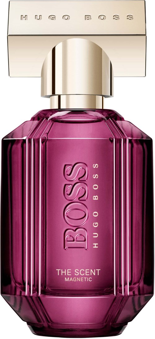 En rosa parfymflaska med guldkork och 'Hugo Boss' logga, märkt 'The Scent Magnetic.'