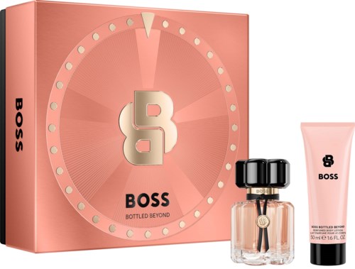 Boss Bottled Beyond perfume set with a pink box, a small perfume bottle, and a matching pink lotion tube.