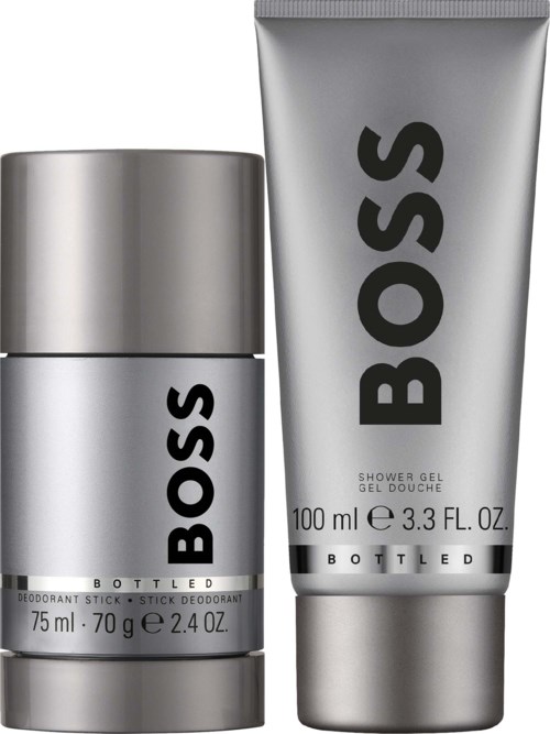 BOSS branded deodorant stick and shower gel bottles, both in silver packaging, with black text and logos.