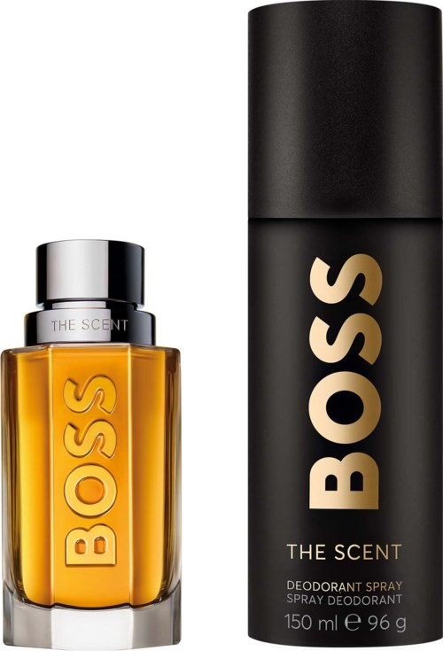 BOSS The Scent perfume bottle next to deodorant spray can.