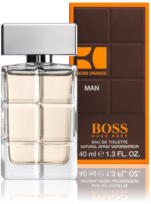 En parfollflaska och en chokladkaka med BOSS-logga och orange förpackning.