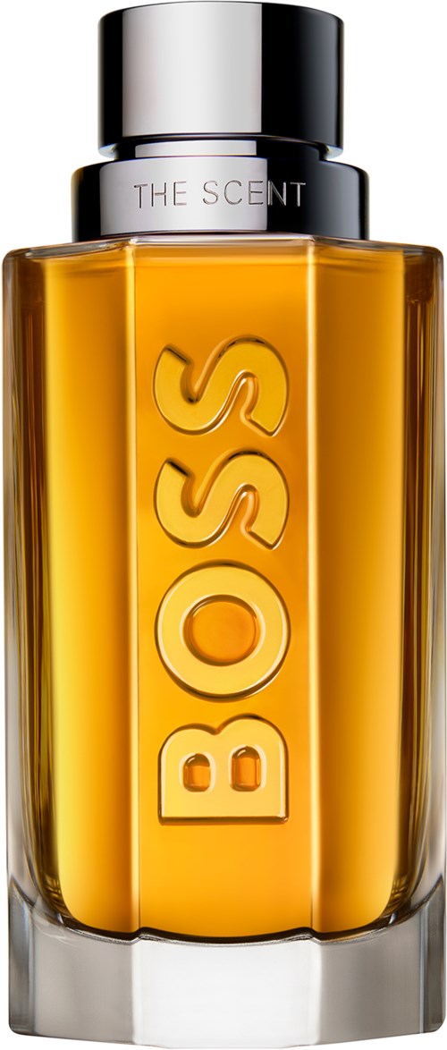 A Boss perfume bottle with a yellow-orange liquid and silver cap, labeled 'BOSS'.