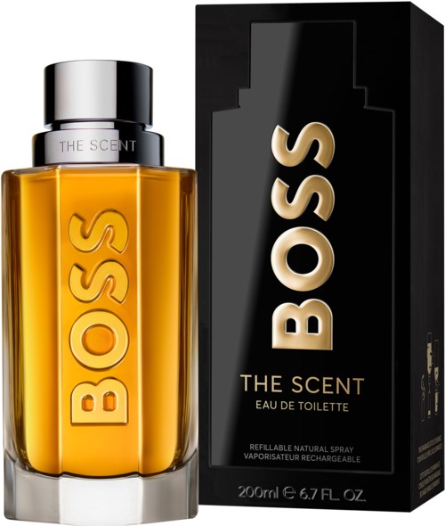 A bottle of BOSS fragrance, yellow liquid inside, with a black and silver cap, next to a black box label.