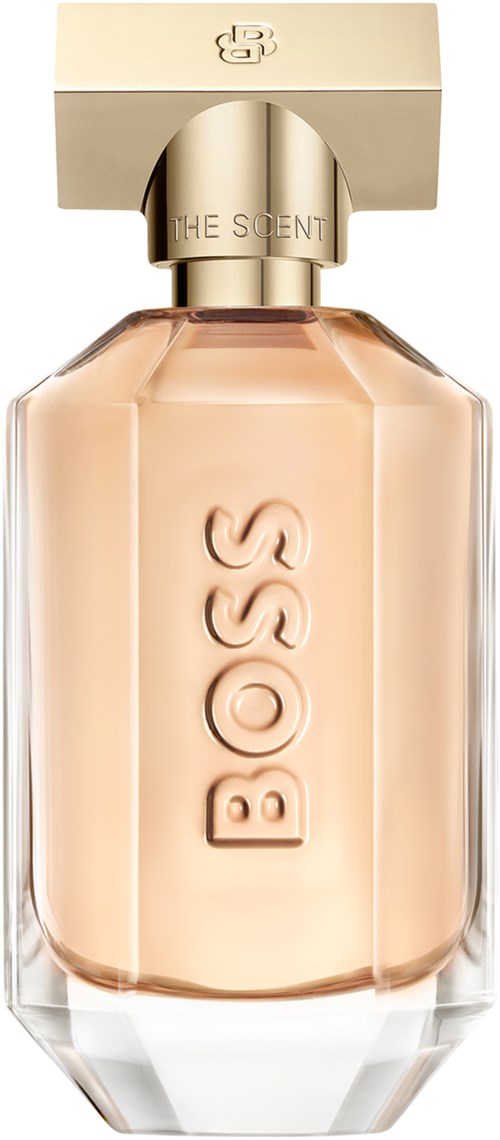 Een parfumfles met een beige dop en het woord BOSS in grote letters op de voorkant.