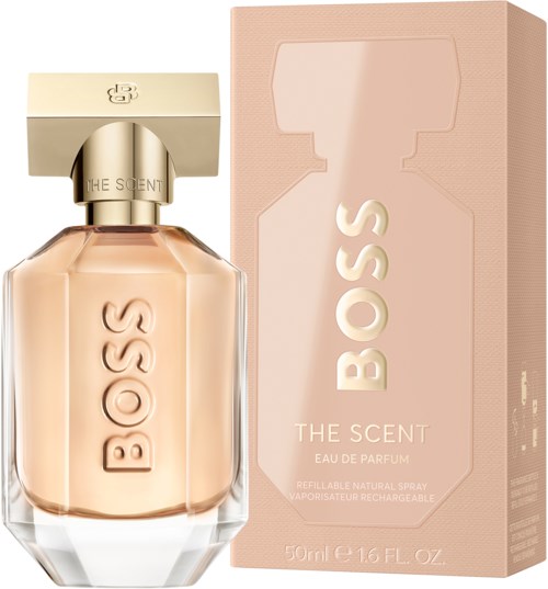 Een roze parfumfles en doos met BOSS-logo en productnaam, voor vrouwen.