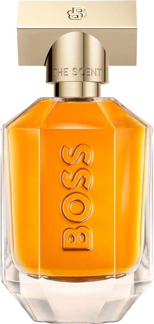 Een parfumfles met oranje vloeistof, geboord BOSS-logo en een beige deksel met The Scent.