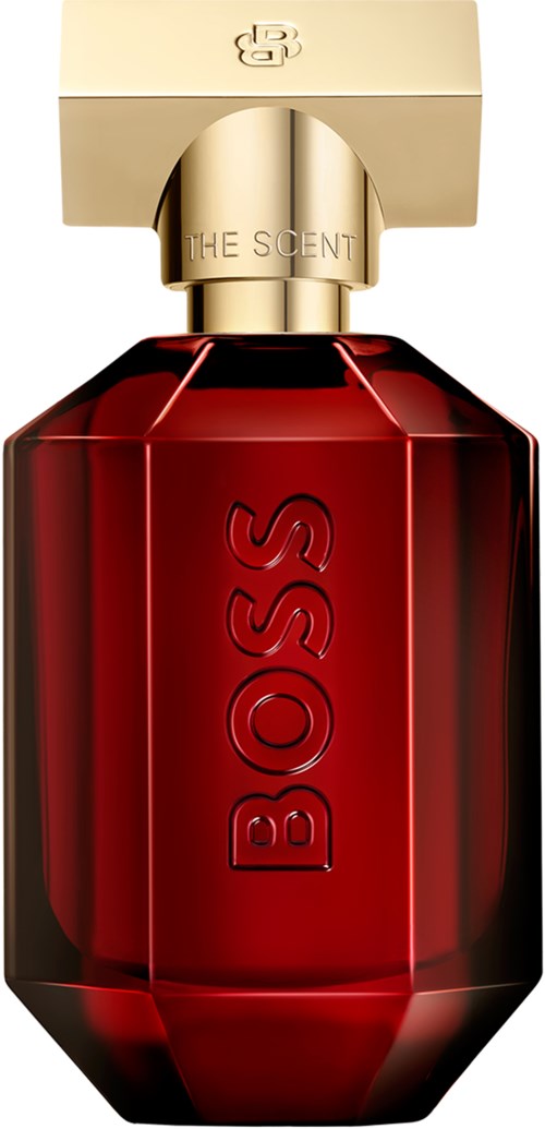 Rode parfumfles met een gouden dop en opgelegde 'BOSS'. De dop heeft 'THE SCENT' geschreven.