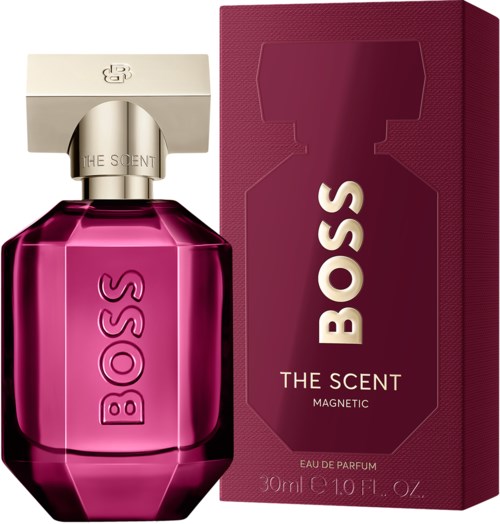 Roze parfumfles met label Boss The Scent Magnetic en bijpassend doos ernaast.