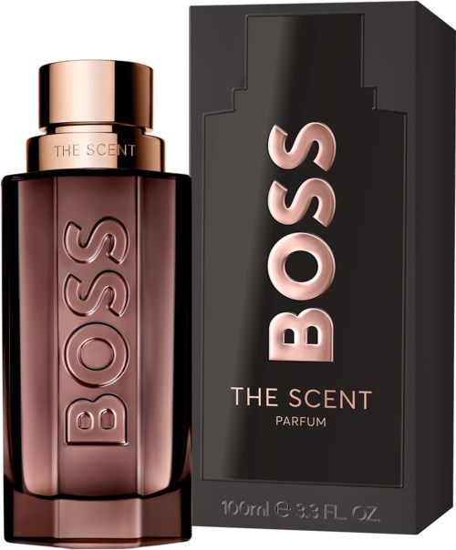 Een Boss parfumfles in bruin glas met grote BOSS-tekst en een zwart doosje met roze BOSS en geurnaam.