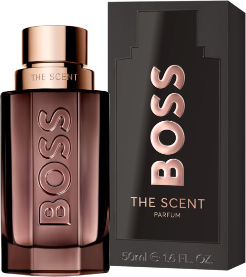 A perfume bottle with a pinkish-brown color and a matching box. The bottle has 'BOSS' embossed on it and a gold cap.
