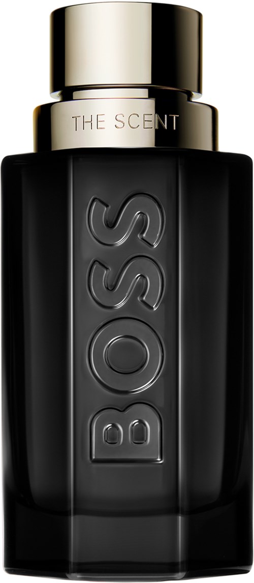 Donkere fles met zilveren deksel, grote BOSS-logo, label zegt 'The Scent', waarschijnlijk parfum of cologne.