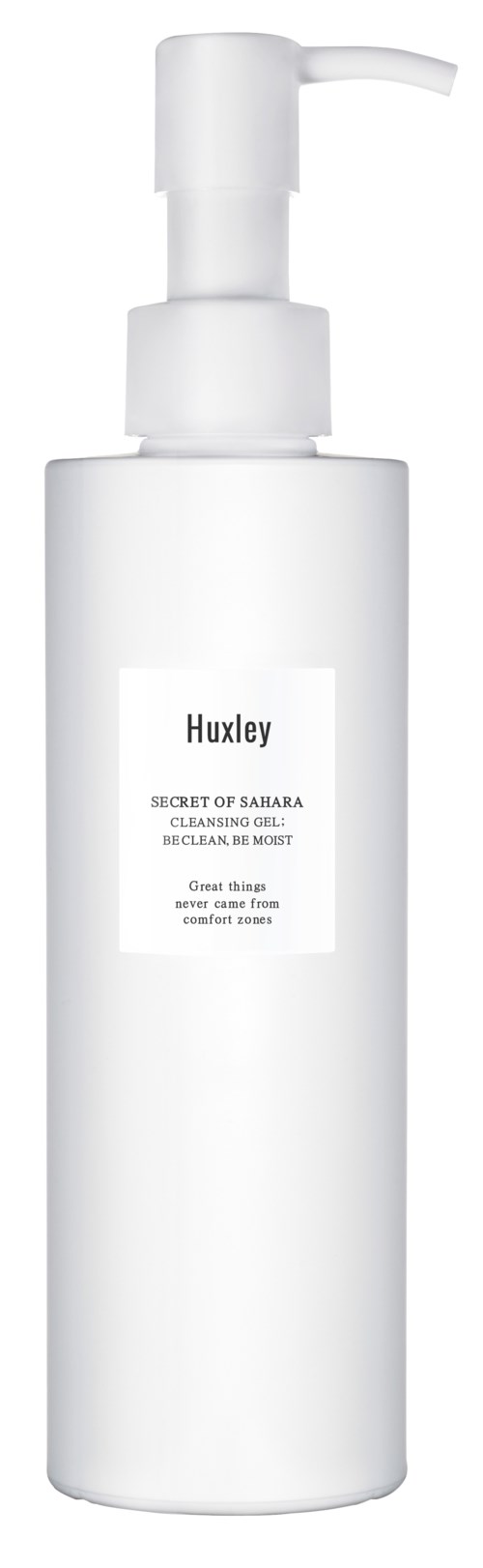 Een witte fles met pomp, gemarkeerd 'Huxley', bevat huidverzorgingsproduct.