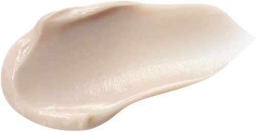 Een klodder witte, romige substantie met een gladde textuur, uitgespreid in een druppelvorm.
