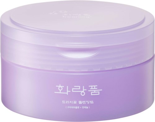 Ein runder lila Behälter mit koreanischem Schriftzug. Es sieht aus wie ein Kosmetik- oder Hautpflegeprodukt.