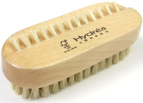 Eine Holz-Bürste mit festen Borsten, mit Hydra London-Logo.