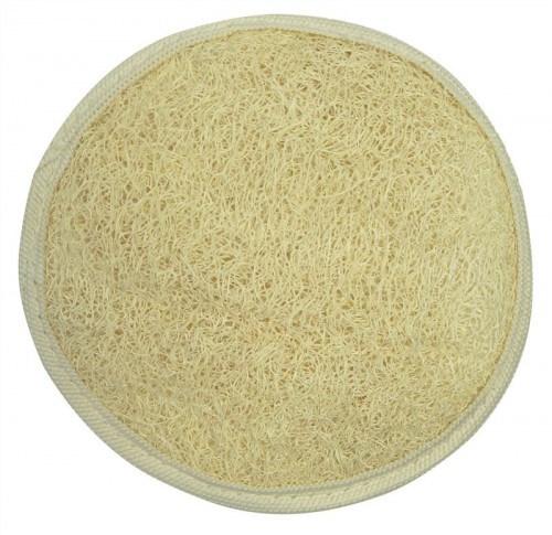 Eine runde, beige, strukturierte Reinigungsschwamm mit leicht rauer Oberfläche und glatten Kanten.
