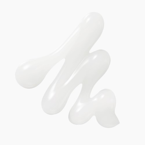 White cream or lotion in a swirled pattern on a white background.