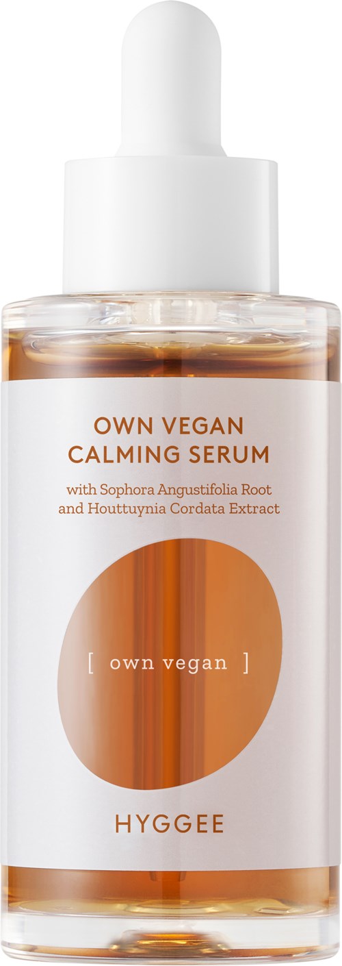 A clear bottle of calming serum with a white dropper top, labeled as own vegan calming serum, containing natural extracts.