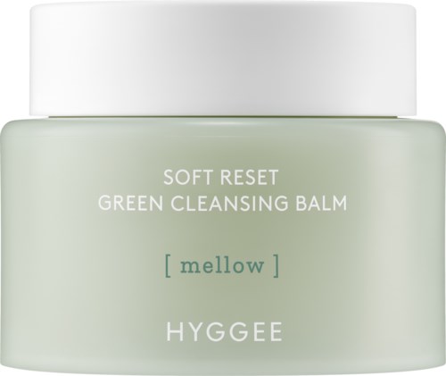 Ein Glas mit grüner Reinigungsbalsam, beschriftet "Soft Reset" und "Mellow" von HYGGEE.