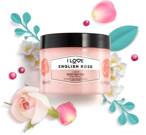 En rosa kroppsbørste med roser og blomster rundt den, med lokk og hvit etikett.