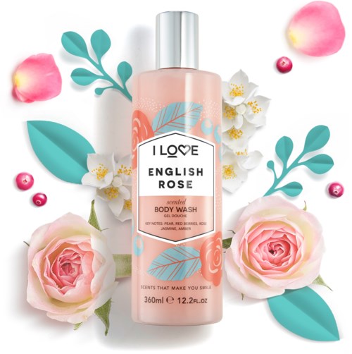 Eine pinke Duschgel-Flasche mit Blumenillustrationen, umgeben von Rosen, Blütenblättern und grünen Blättern.