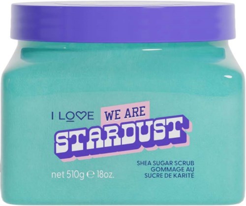 Pink and purple label on a green jar. Text mentions love, stardust, shea sugar scrub. Container size is 510 grams.