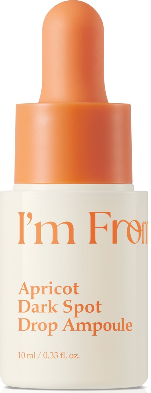 A small bottle with a dropper, labeled 'I'm F' and 'Apricot Dark Spot Drop Ampoule,' contains skin treatment.